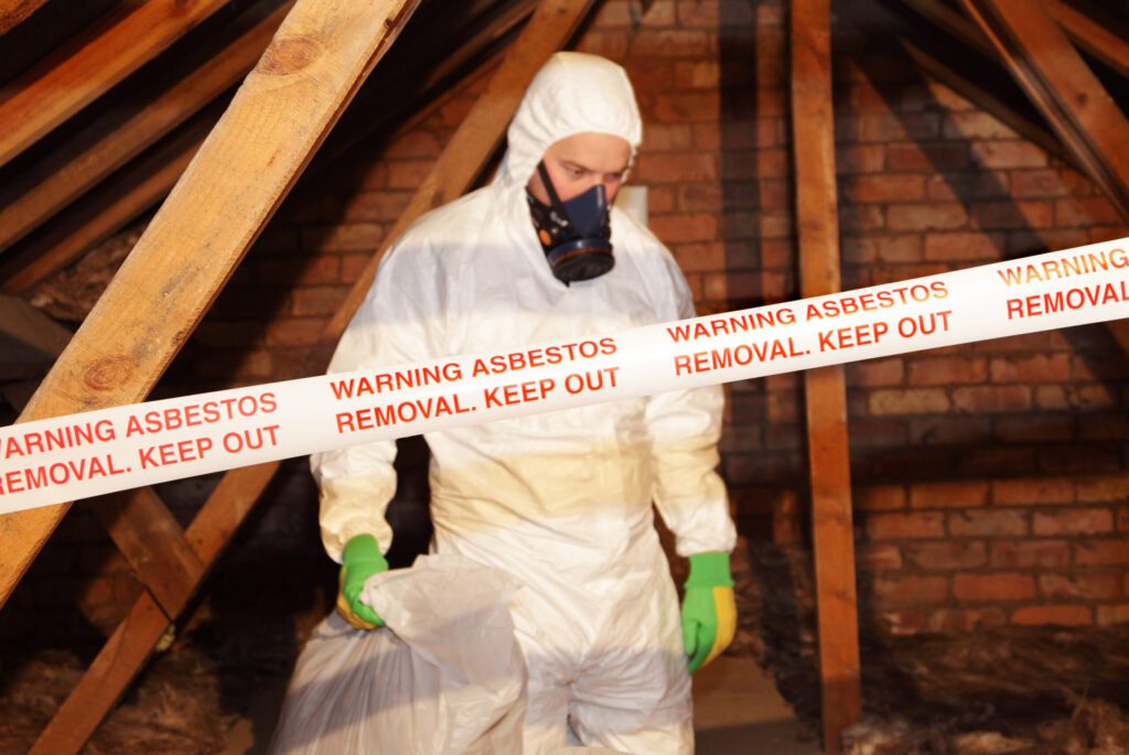 asbestos professional in hazmat suit