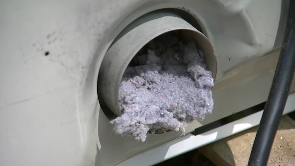 Dryer vent exhaust filled with combustible lint.